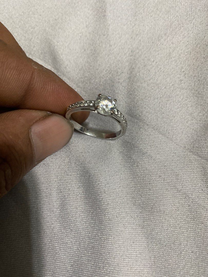 ring (Category: Accessories) located in Ulu Tiram. Submitted by oyster396 (Listing ID 1293540739, Image 3). Description: Swarovski’s Attract Round ring is a truly romantic gift. This stunning, rhodium-plated ring features a round chaton in the center with sparkling chatons on either side. The chatons embellish the front half of the ring. The perfect jewelry piece for day or evening outfits! Article no.: 5032922 Color: White Material: Rhodium plat
