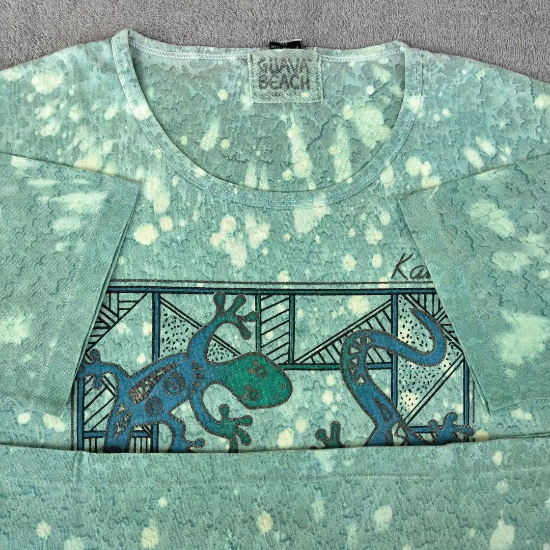 Vintage Kauai Destination Tee (Category: Tshirts & Polo Shirts ) located in Tayug. Submitted by mart_ii.vtg (Listing ID 1293518284, Image 2). Description: Vintage Kauai Destination Tee • ©Guava Beach • XL on tag • Width: 22.5in • Length: 27in • Condition: 9/10 • Issue: faded Claim: ₱299.00 + SF DM me for more details. *Colors may vary due to lighting and enhancement* #vintageph #vintage #vintageshirt #vintagegraphicshirt #souvenirshirt.
