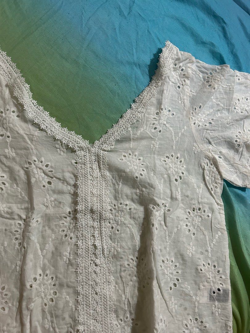 White Eyelet Blouse (Category: Blouses) located in Makati City. Submitted by declutterwjn_ (Listing ID 1293534748, Image 2). Description: Best fits large to XL frames.
