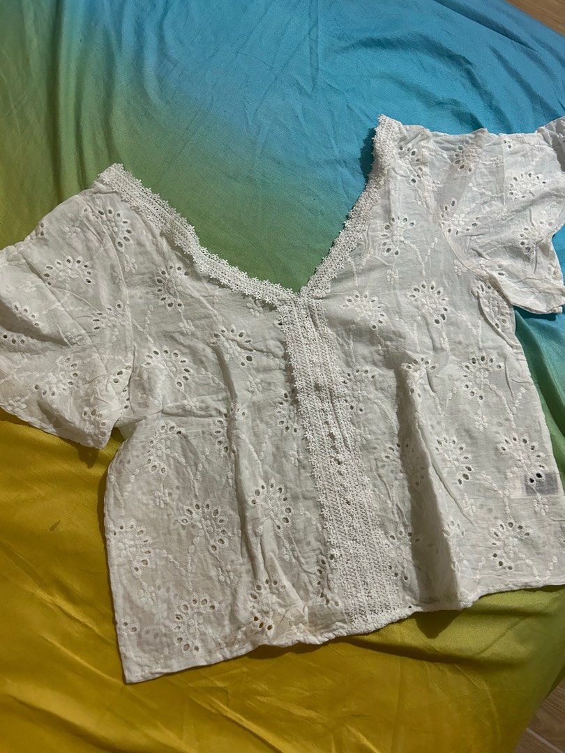 White Eyelet Blouse (Category: Blouses) located in Makati City. Submitted by declutterwjn_ (Listing ID 1293534748, Image 1). Description: Best fits large to XL frames.