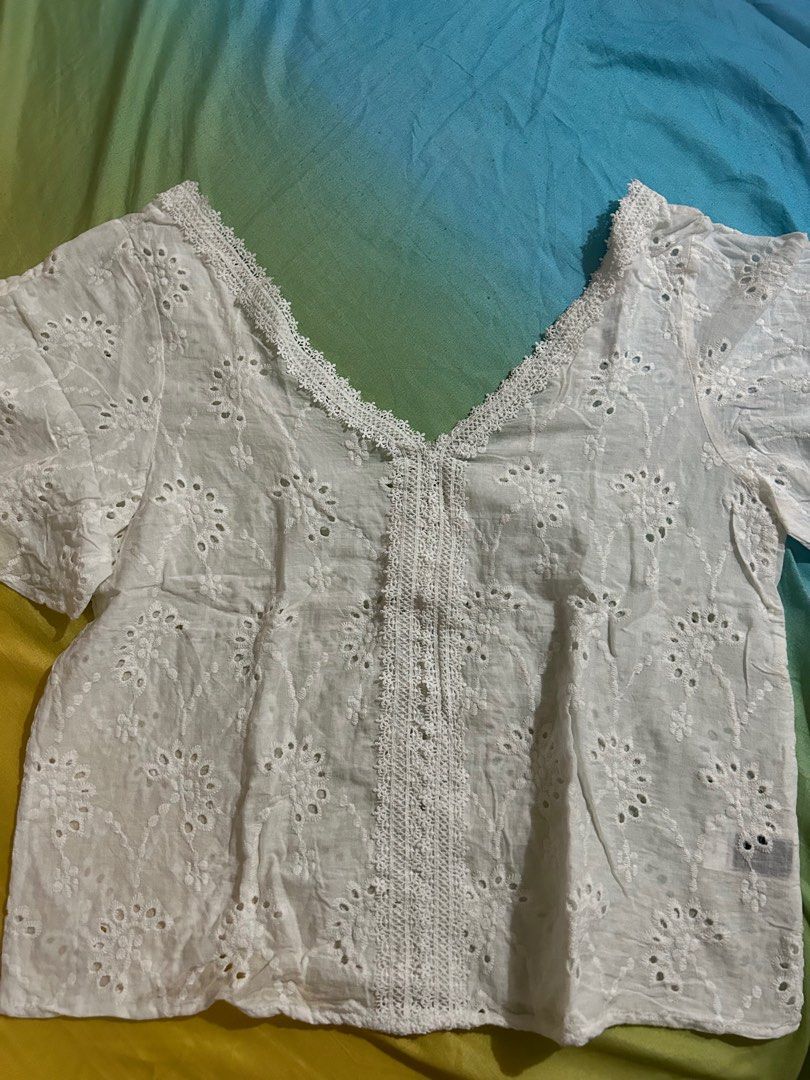White Eyelet Blouse (Category: Blouses) located in Makati City. Submitted by declutterwjn_ (Listing ID 1293534748, Image 3). Description: Best fits large to XL frames.