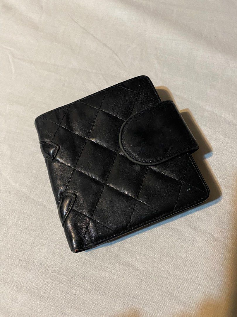 Authentic Chanel Black Bi-fold Cambon Line Clasp Wallet (Category: Luxury Bags & Wallets) located in Quezon City. Submitted by tokyotrendsph (Listing ID 1293678322, Image 3). Description: 🤍 Authentic Chanel from Japan 🤍 See pictures for evident flaws 🤍 Needs to be restored .