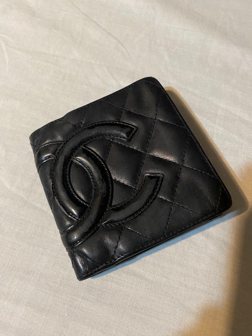 Authentic Chanel Black Bi-fold Cambon Line Clasp Wallet (Category: Luxury Bags & Wallets) located in Quezon City. Submitted by tokyotrendsph (Listing ID 1293678322, Image 1). Description: 🤍 Authentic Chanel from Japan 🤍 See pictures for evident flaws 🤍 Needs to be restored .