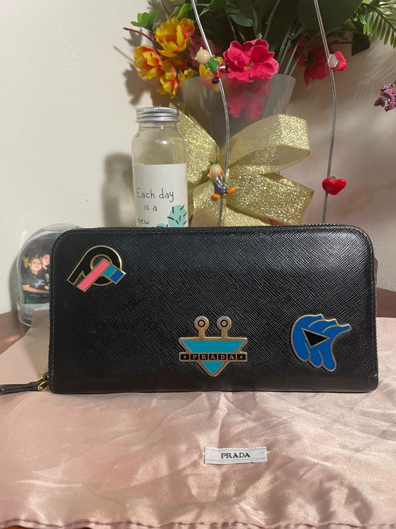 Authentic💯 Prada Robot Saffiano Black Leather Zip Around Continental Wallet (Category: Luxury Bags & Wallets) located in Tagum. Submitted by maryjanepradalux (Listing ID 1293633046, Image 2). Description: *no inclusion *no issue *Good as new *bought from singapore *Pm for details😍😍😍 .