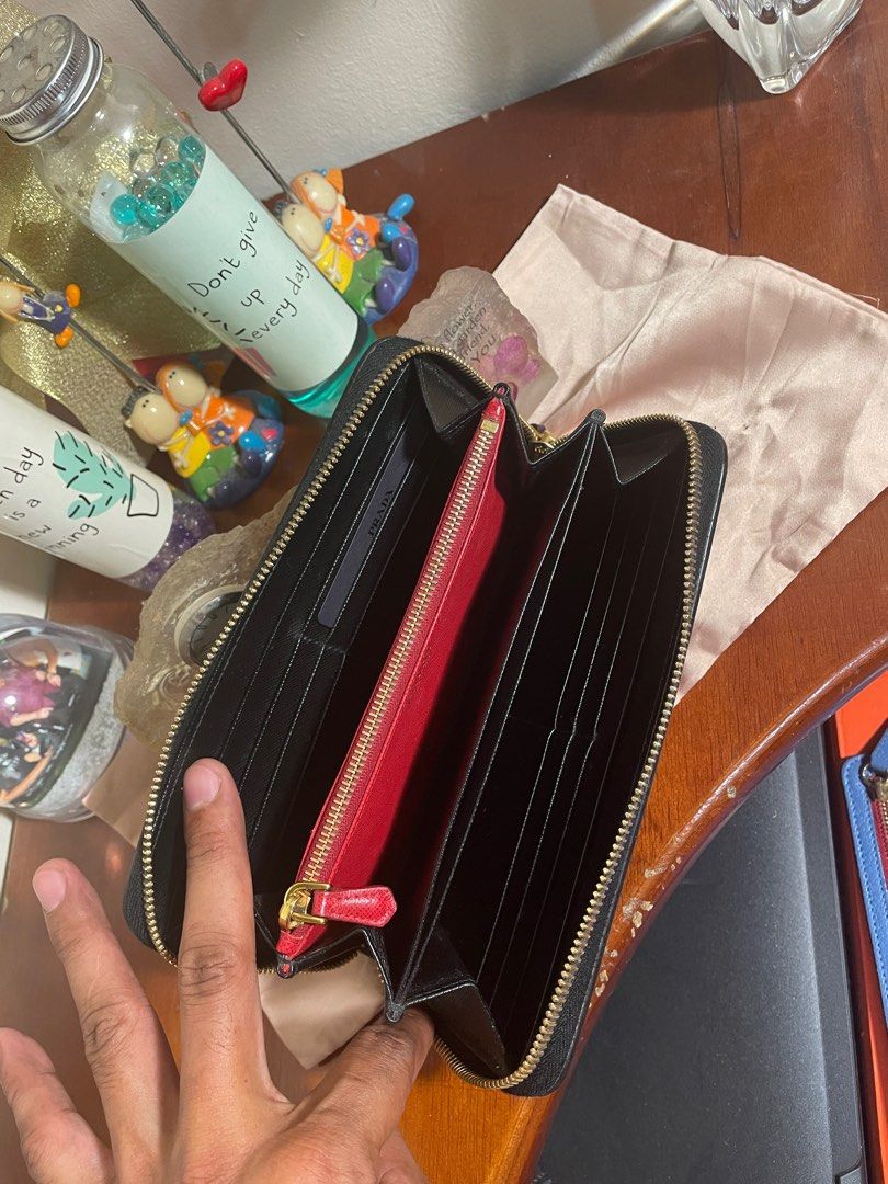 Authentic💯 Prada Robot Saffiano Black Leather Zip Around Continental Wallet (Category: Luxury Bags & Wallets) located in Tagum. Submitted by maryjanepradalux (Listing ID 1293633046, Image 3). Description: *no inclusion *no issue *Good as new *bought from singapore *Pm for details😍😍😍 .