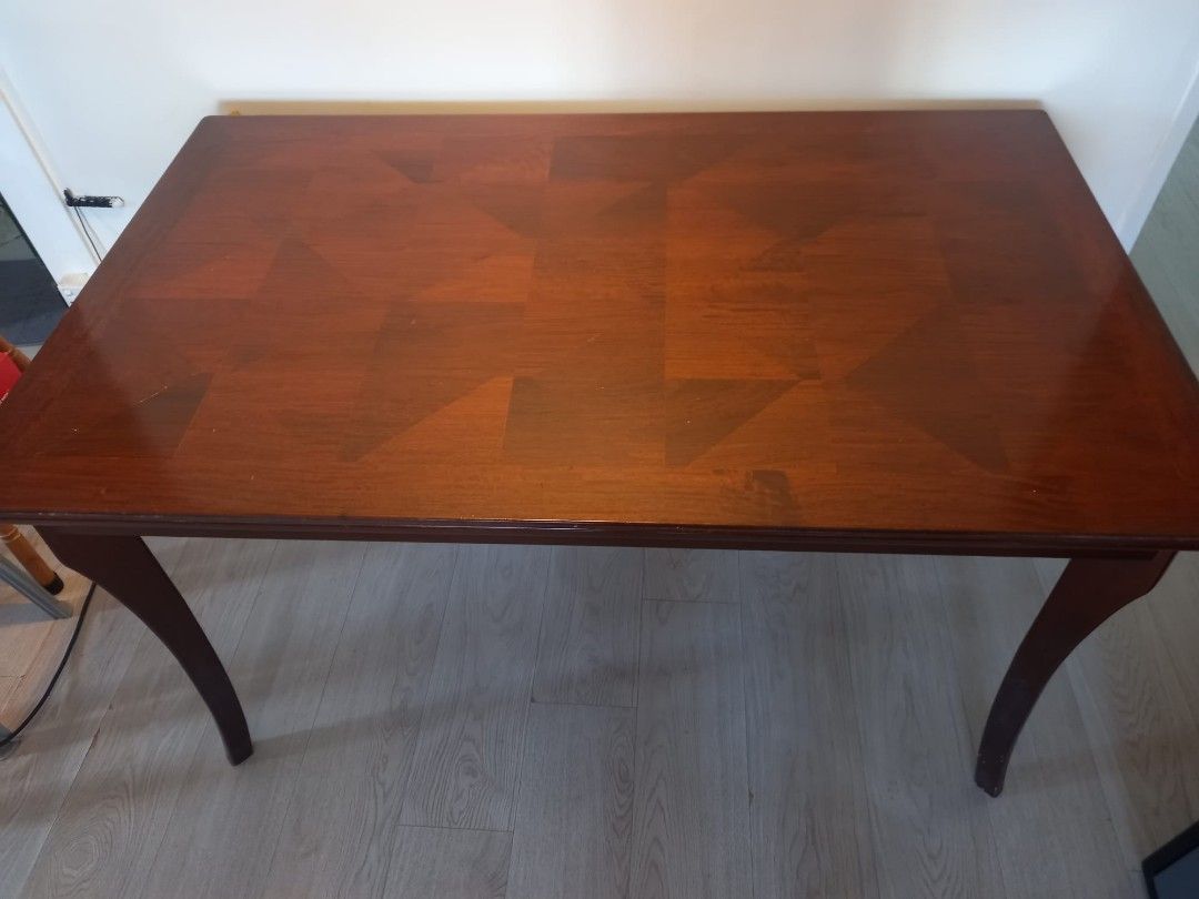 Dining Table solid wood (Category: Tables & Sets) located in Singapore. Submitted by bonjournihao (Listing ID 1293673327, Image 1). Description: Well used solid wood dining table to let go due to shifting. Buyer to arrange own transportation.