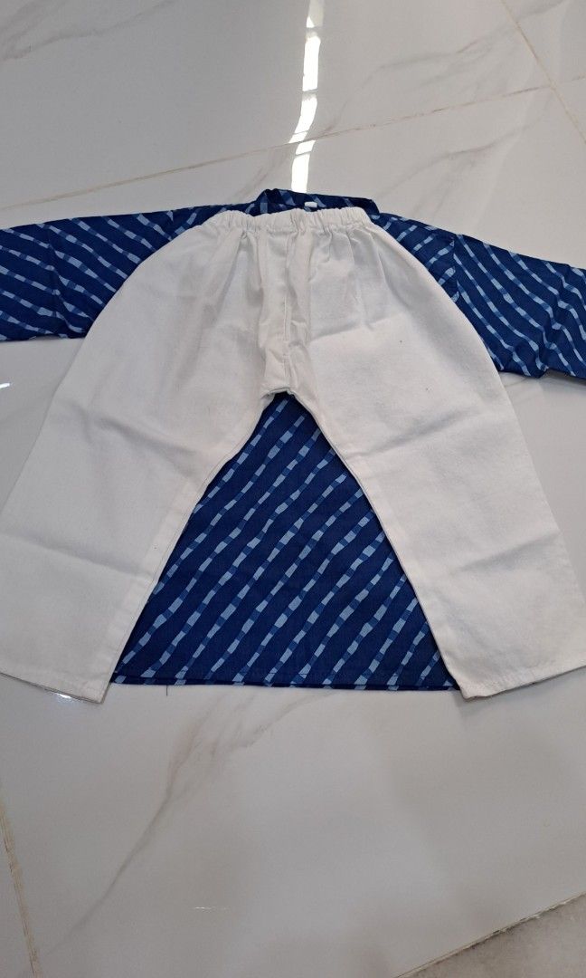 Kurta (Category: Babies & Kids Fashion) located in Subang Jaya. Submitted by hanikram_stone (Listing ID 1293677597, Image 3). Description: Cotton kurta set. Material cotton. Tag size 16. Boleh guna utk raya juga. Sesuai utk usia 12 bulan ikut saiz badan budak. Ada 1 dot hitam pen, x nampak bila dah pakai.