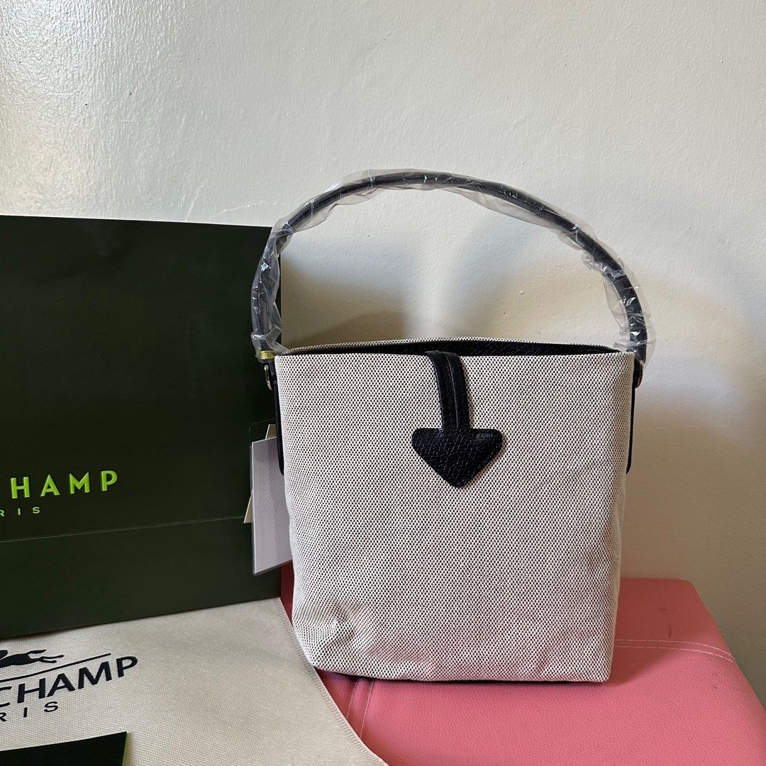 Longchamp Bucket Bag Canvas Limited Edition (Category: Luxury Bags & Wallets) located in Makati City. Submitted by lux.mariah (Listing ID 1293596147, Image 3). Description: 💯 Guaranteed Authentic Limited stocks only / Perfect for giftings Bucket Bag Brand new & Complete Inclusions • Care card - Dustbag - Paperbag We ship nationwide. Mode of payment: • Gcash - BDO - Maya Courier: • J&T - Lalamove - LBC.