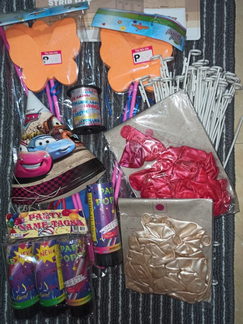 PARTY FAVORS (FOR TAKE ALL ONLY) (Category: Occasions & Party Supplies) located in Caloocan City. Submitted by caramelann14 (Listing ID 1293614204, Image 1). Description: PARTY FAVORS (FOR TAKE ALL ONLY) 🏷️ 150 2 packs balloons, sticks, hat, décor and poppers.