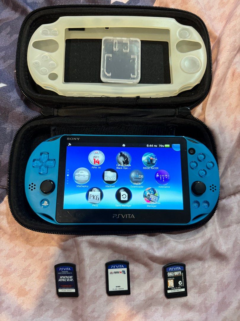 Psvita 2k 64gb jailbreak with three original games, Video Gaming, Video  Game Consoles, PlayStation on Carousell