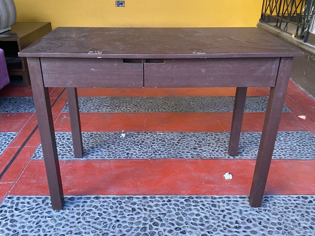 Slim Desk / Console Table (Category: Tables & Sets) located in Paranaque City. Submitted by monicaseb (Listing ID 1293721759, Image 1). Description: - LWH: 40" x 20" x 30" - signs of use: damaged/chipped part on side (photo 8) - tape residue on surface (photos 9 & 10) but can easily cleaned off - surface will be cleaned before shipping Pickup only - BF Paranaque.