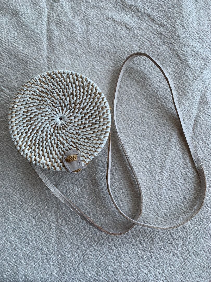 Small Round White Rattan Bag (Category: Cross-body Bags) located in Kuala Lumpur. Submitted by shop.marie.preloved (Listing ID 1293596157, Image 1). Description: ✔️Serious buyers only. ✔️Please read the full item description. Small Round White Rattan Bag Leather strap A vibrant cotton Batik Print on the inside lining Width 15cm / Depth 7.5cm / Length of Strap 115cm Slight discoloration on the inside of the strap and folding (shown in photo 7 and 