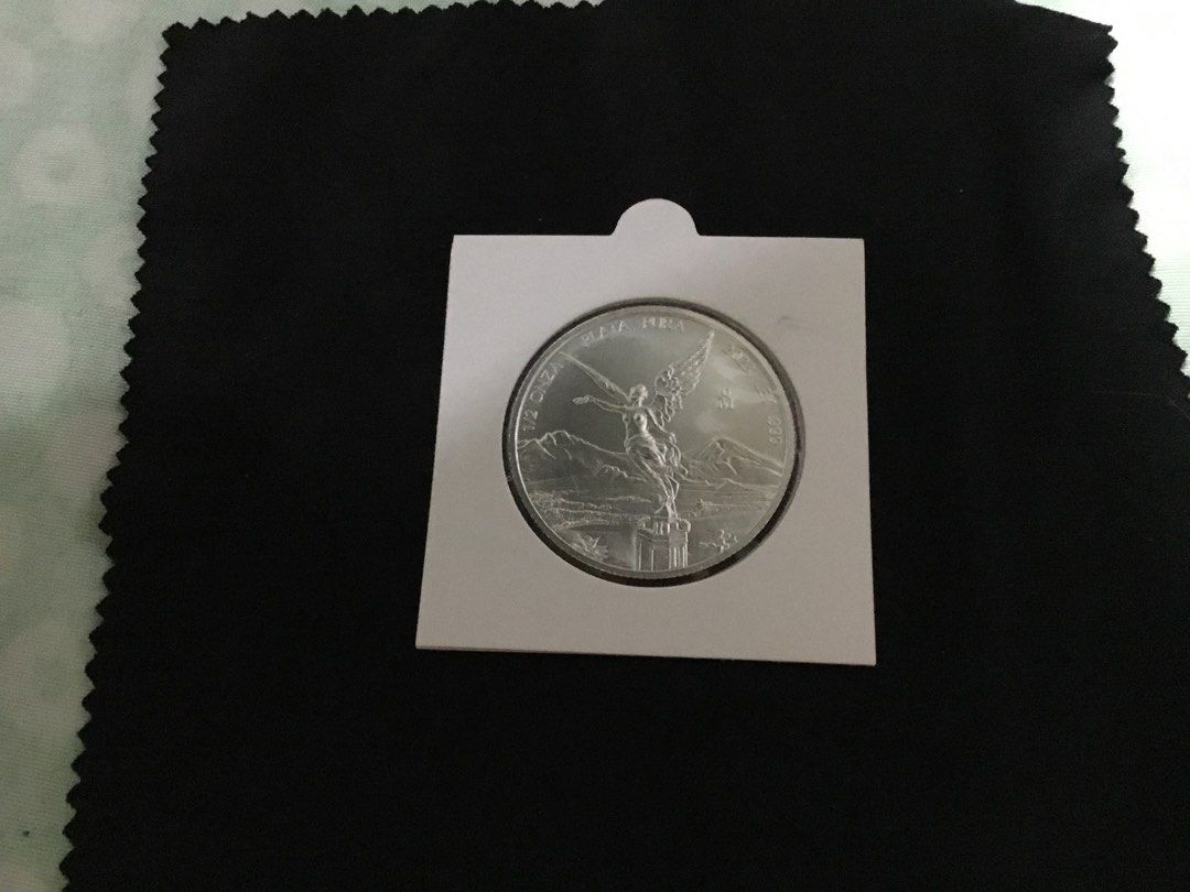 “2023”Mex Libertad silver 1/4 oz coin (Category: Currency) located in Del Monte. Submitted by bernapi63 (Listing ID 1293603898, Image 3). Description: “2023”Mexican silver 1/4 oz Libertad Coin.999 fineness 7.61 grams weight as shown on cardboard cover only Brilliant and Uncirculated approx 28mm diameter.
