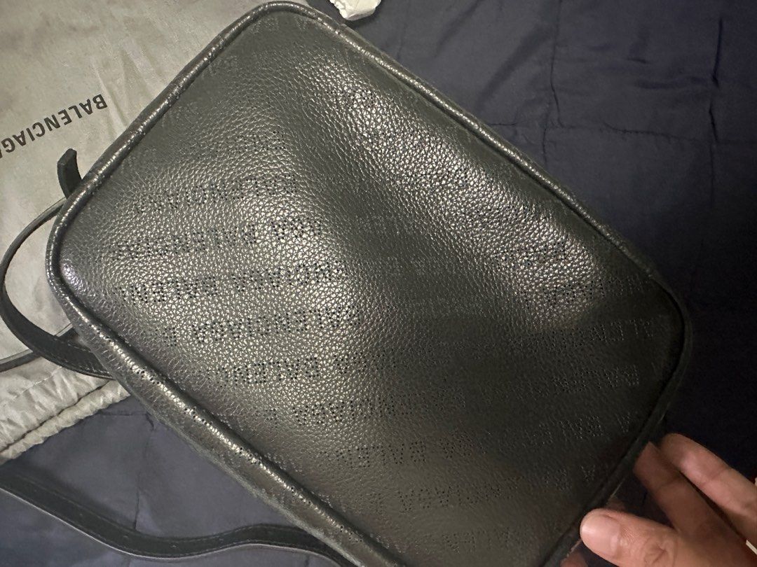 Balenciaga Camera Bag (Category: Luxury Bags & Wallets) located in Makati City. Submitted by theguywhosells.ph (Listing ID 1293920354, Image 2). Description: Balenciaga Camera Bag Used once last year during Christmas Dinner Dust bag only Willing to meet up around Makati, BGC or Megamall if you want to make sure authenticity .