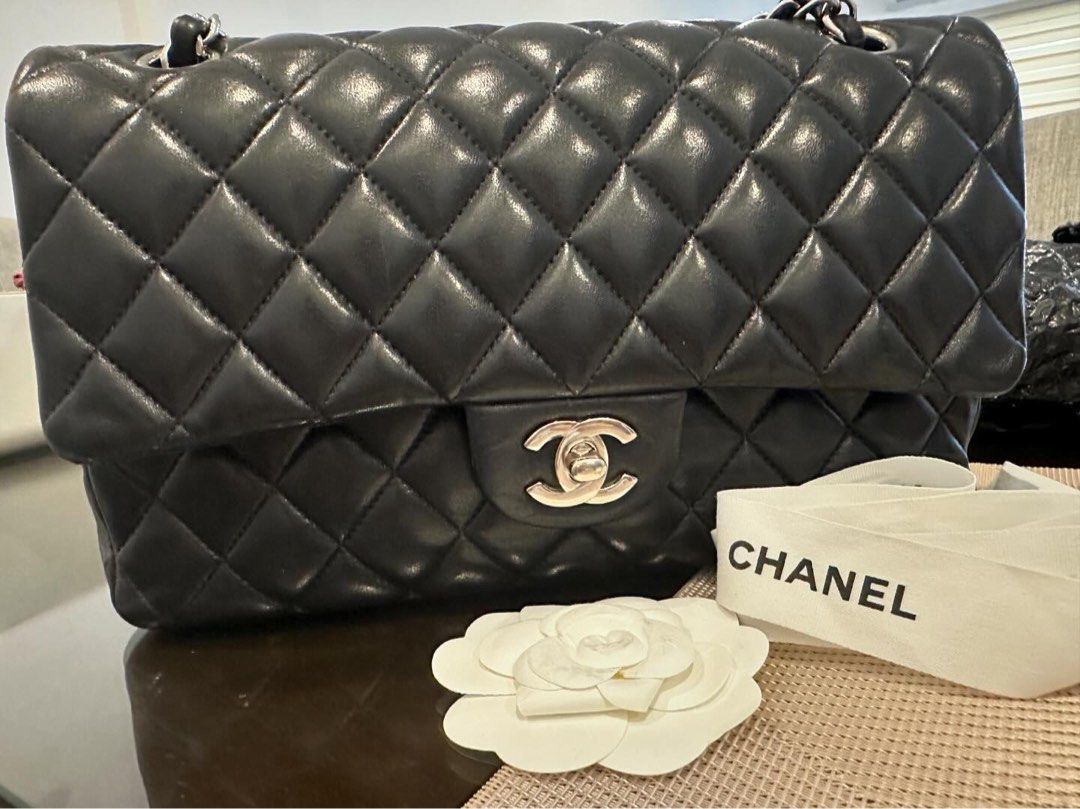 CHANEL BAG (Category: Luxury Bags & Wallets) located in Manila. Submitted by laropa_filipinas (Listing ID 1293769065, Image 2). Description: Chanel double flap Lambskin ( medium size) Silver hardware Complete sis , box , dustbag , paper bag, certificate.