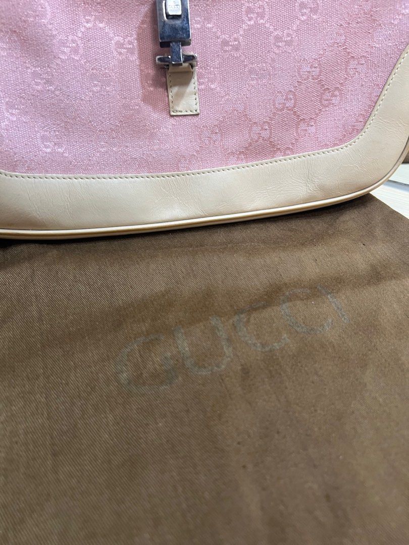 Gucci Jackie Pink Shoulder Bag (Category: Luxury Bags & Wallets) located in Quezon City. Submitted by sarisarisale (Listing ID 1293910963, Image 2). Description: Gucci Jackie Pink With original dustbag Clean inside and out Normal signs of use Issues: faded hardwares, stain at the bottom. All details are posted. Kindly zoom in. PM for more details..