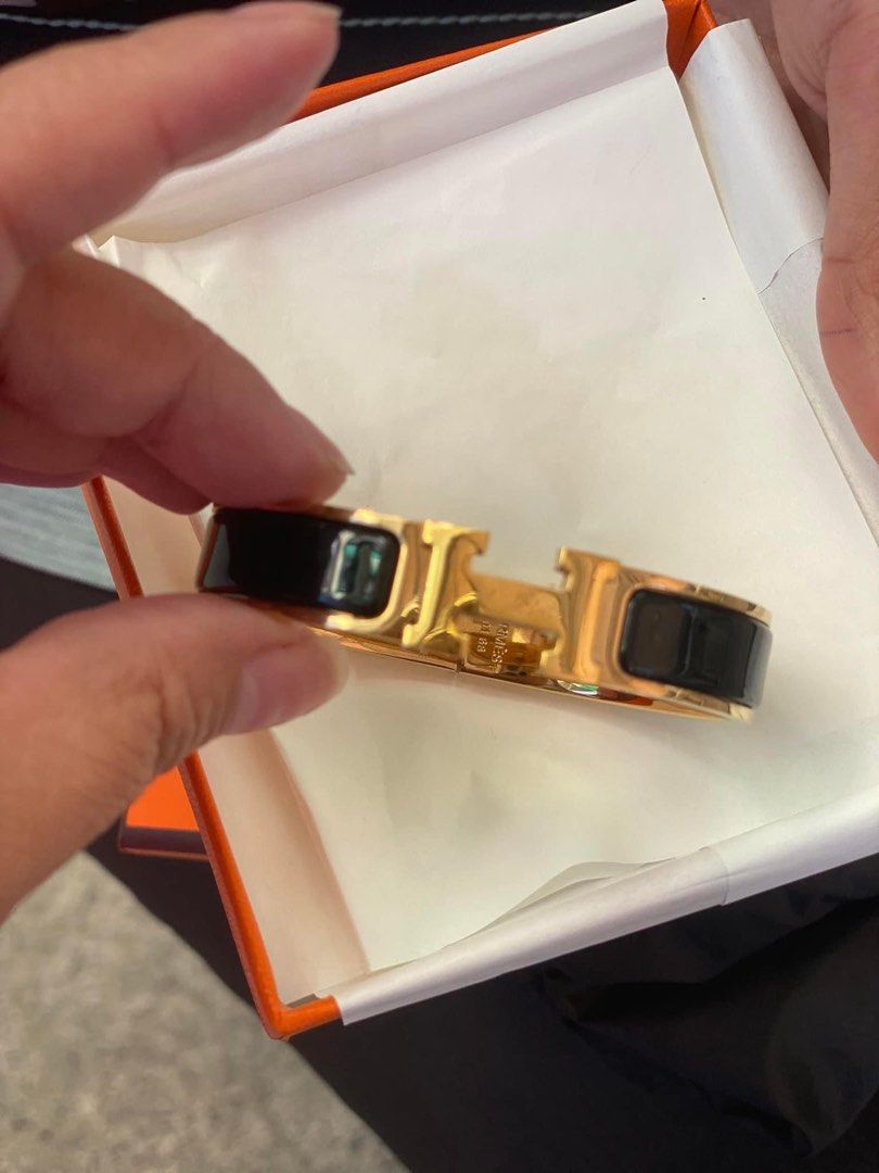 Hermes Clic H Bracelet PM Size Black & Light Pink (Category: Luxury Accessories) located in Makati City. Submitted by andeng28 (Listing ID 1293917566, Image 1). Description: Hermes Clic H Bracelet Tiffany Blue: Brandnew. With Paper Bag inclusion only.