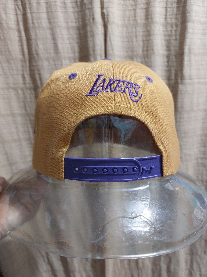 Lakers Real Fire Cap 1 (Category: Caps & Hats) located in Muntinlupa City. Submitted by sakurambo_des (Listing ID 1293806262, Image 3). Description: Los Angeles Lakers Realfire Men's Cap in very good condition.
