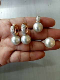 South sea pearls set with diamonds in gold setting