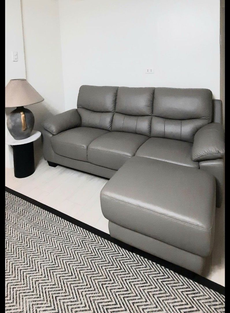 3 seater italian leather sofa with ottoman (Category: Sofas) located in Manila. Submitted by nyeragiti (Listing ID 1290635825, Image 2). Description: almost new 3 seater sofa with ottoman in taupe color. italian leather. slightly negotiable. metro manila or rizal area only. buyer shoulders shipping. gcash or bpi payment only..