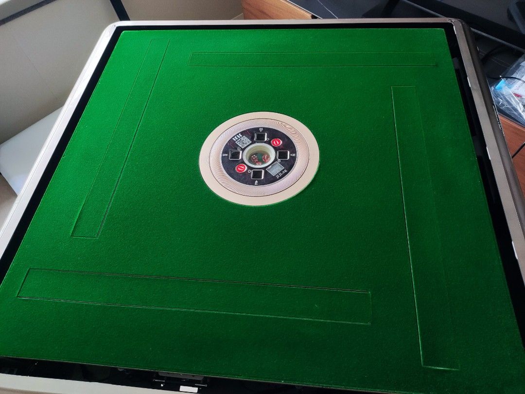Automatic Mahjong Table (Category: Tables & Sets) located in Singapore. Submitted by leemh92 (Listing ID 1290638159, Image 1). Description: Helping to sell well-used auto mahjong table cheap, so not for fussy people. Selling table only (no tiles), no nego letting go at low price due to decluttering. Please arrange own delivery. Table mechanism is still working as machine can all move. But note that when last used, one side seemed to have some iss