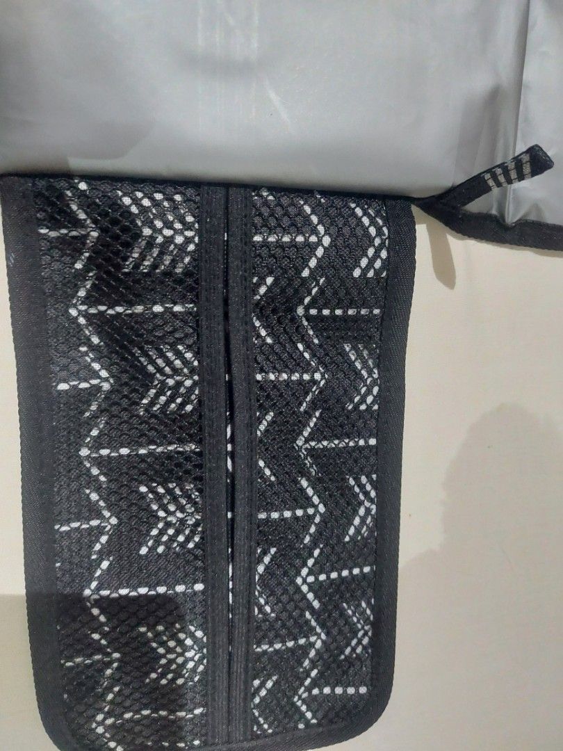 Baby portable changing pad (Category: Changing Mats & Accessories) located in Manila. Submitted by jayar29 (Listing ID 1290790524, Image 3). Description: changing pad for babies waterproof and has pockets for wet wipes etc.. reason for selling recieved two as gift...decluttering buyer pays for shipping fee.