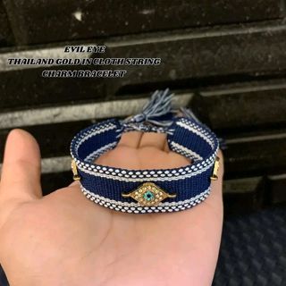Evil eye in cloth bracelet