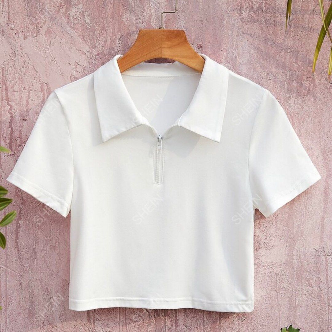 Half Zip Solid Tee (Category: Blouses) located in Cavite. Submitted by daneramos (Listing ID 1290800676, Image 1). Description: white crop top never worn.