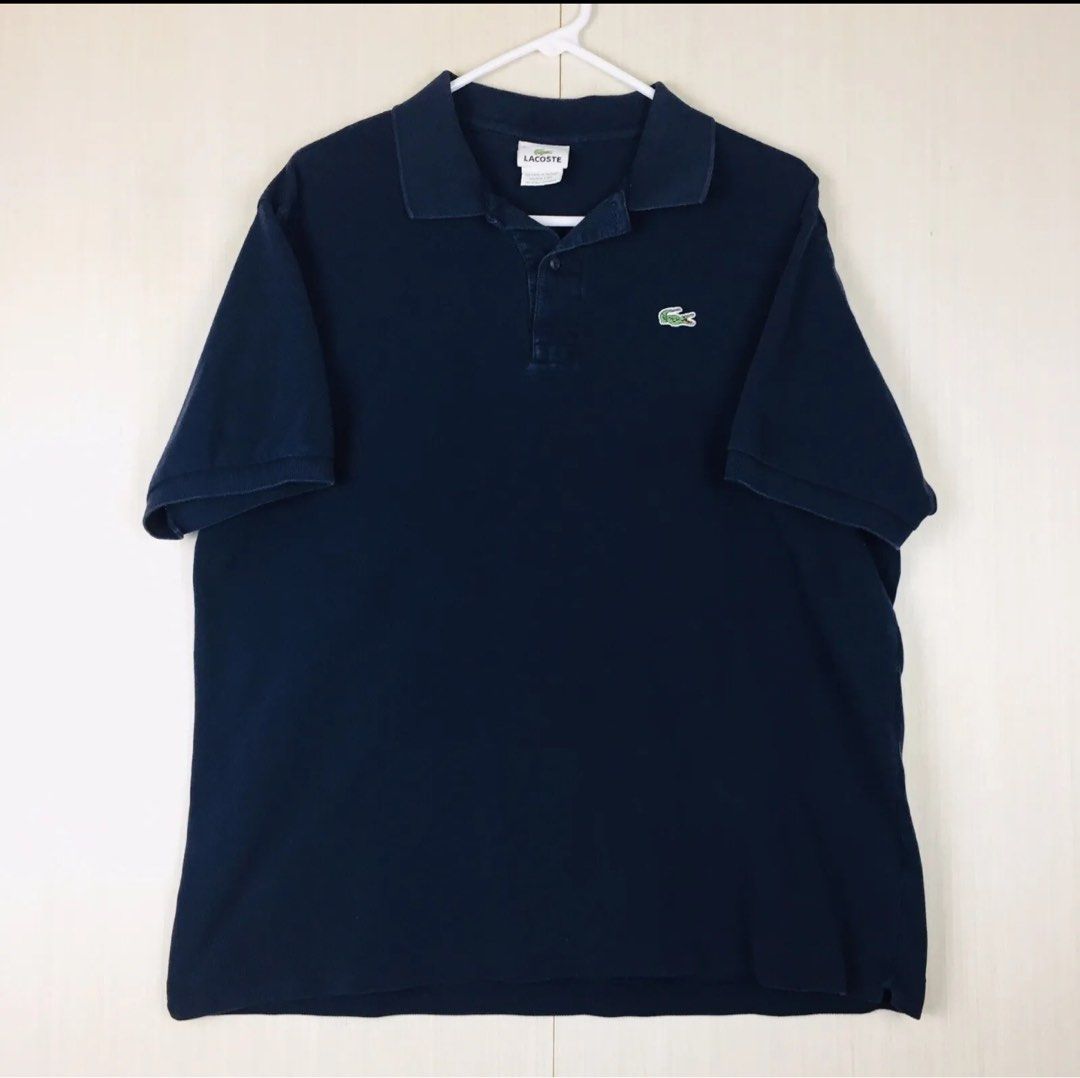 Lacoste Polo Shirt - Navy Blue (Category: Tshirts & Polo Shirts ) located in Paranaque City. Submitted by gabimp (Listing ID 1290642807, Image 1). Description: LACOSTE Men’s Polo Shirt Features: Brand: LACOSTE Slim Fit Style: Polo Size: 7 (XL) (Extra Large) Color: Solid Navy Blue Closure: Button Up (2 Buttons) Collar: Spread Lacoste Log Patch on the Front Left Chest Sleeve: Short Sleeve Shoulder to Shoulder Length: About 18-7/8” Arm Pit to Arm Pi