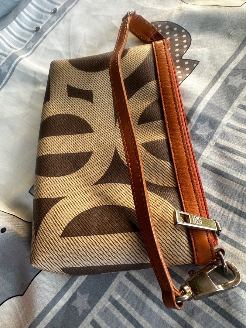 Louis Quatorze pochette bag (Category: Luxury Bags & Wallets) located in Tagum. Submitted by itscookiemonster (Listing ID 1290717486, Image 2). Description: Louis Quatorze Pochette Bag. Well used with minimal rubs on each corner as sign of use. Size: 9”x 6” (HxW) Small size .