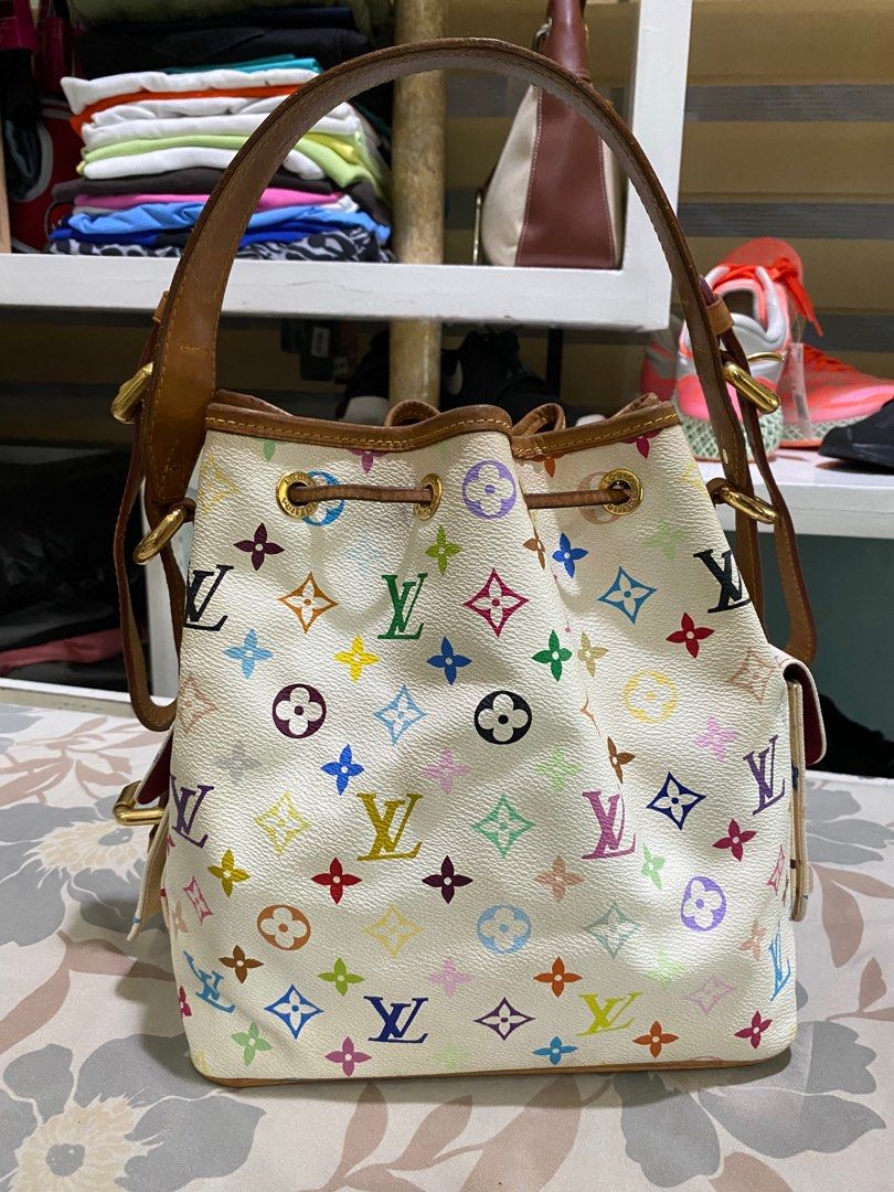 LV x Murakami (Category: Luxury Bags & Wallets) located in Manila. Submitted by novymaesel14868 (Listing ID 1290652849, Image 2). Description: Louis Vuitton White Murakami Multicolor Petit Noe Bucket Bag Preloved 100% Authentic Condition: very good used condition Flaws: super minimal sign of used, no major flaws! Dm if interested Negotiable! .