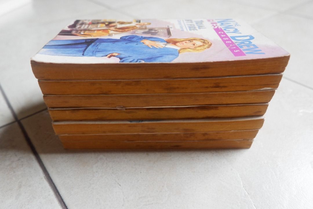 Nancy Drew Books (Category: Storybooks) located in Quezon City. Submitted by miletdeclutters (Listing ID 1290751192, Image 3). Description: PHP 180 EACH paperback, with foxing/tanning no writings/highlights Published by Archway Paperback Case 15: Trial by Fire Case 18: Circle of Evil (wrapped in plastic cover) Case 22: Fatal Attraction Case 28: The Black Widow (wrapped in plastic cover) Case 29: Pure Poison (wrapped in plastic cover) Case 37: Las