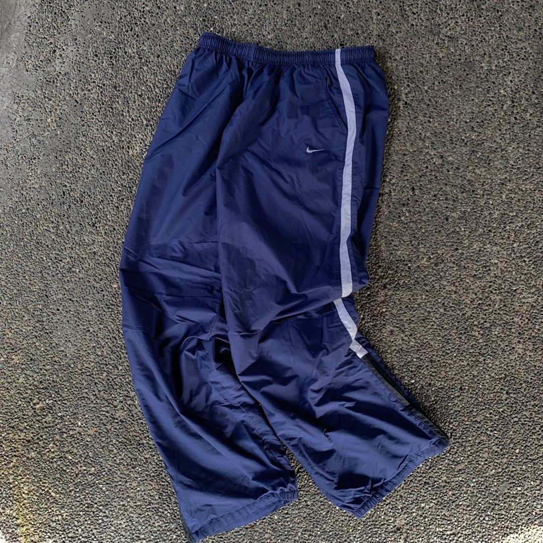 NIKE TRACKPANTS, Men's Fashion, Bottoms, Joggers on Carousell