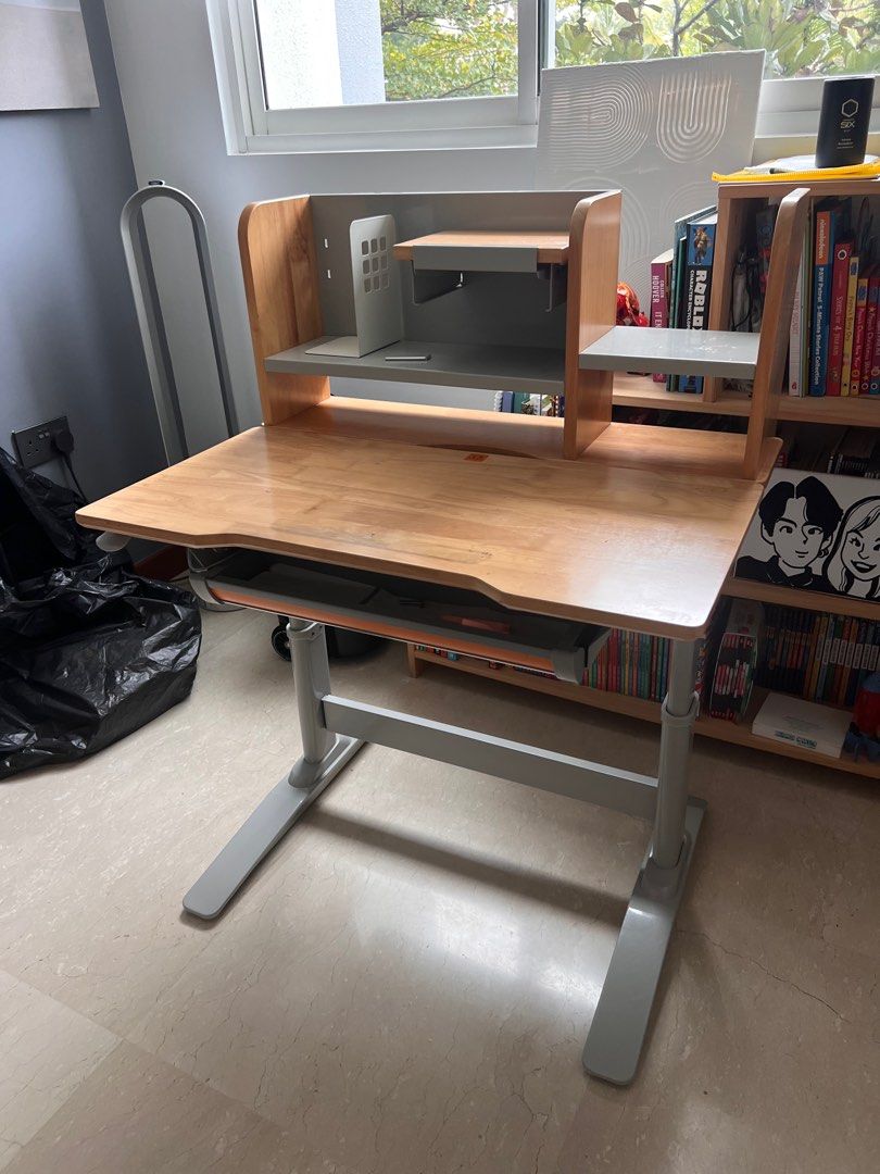 Study Table (Category: Tables & Sets) located in Singapore. Submitted by little_n (Listing ID 1290717674, Image 2). Description: Product details in the image. Used for 3 years. There is a wrist rest cushion stain on the table. And the table needs to be tightened. .
