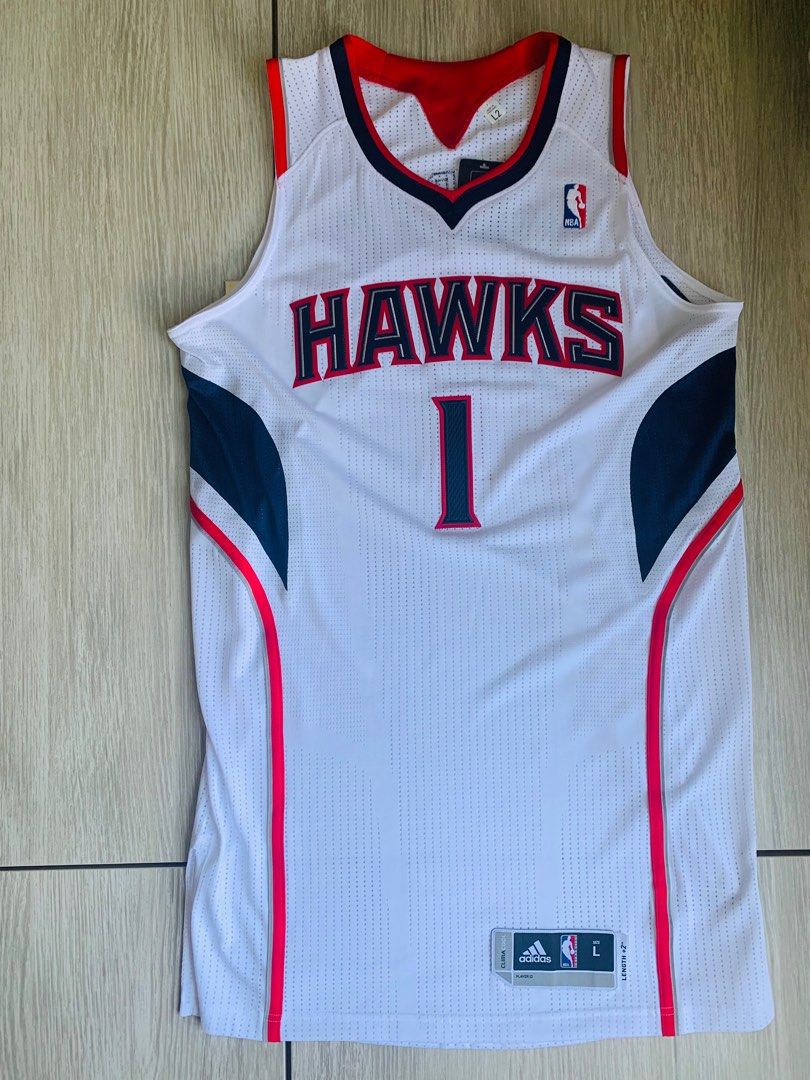 Tracy mcgrady best sale hawks jersey