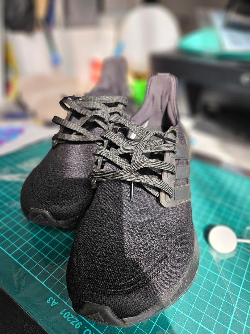 Fake triple black ultra boost hot sale