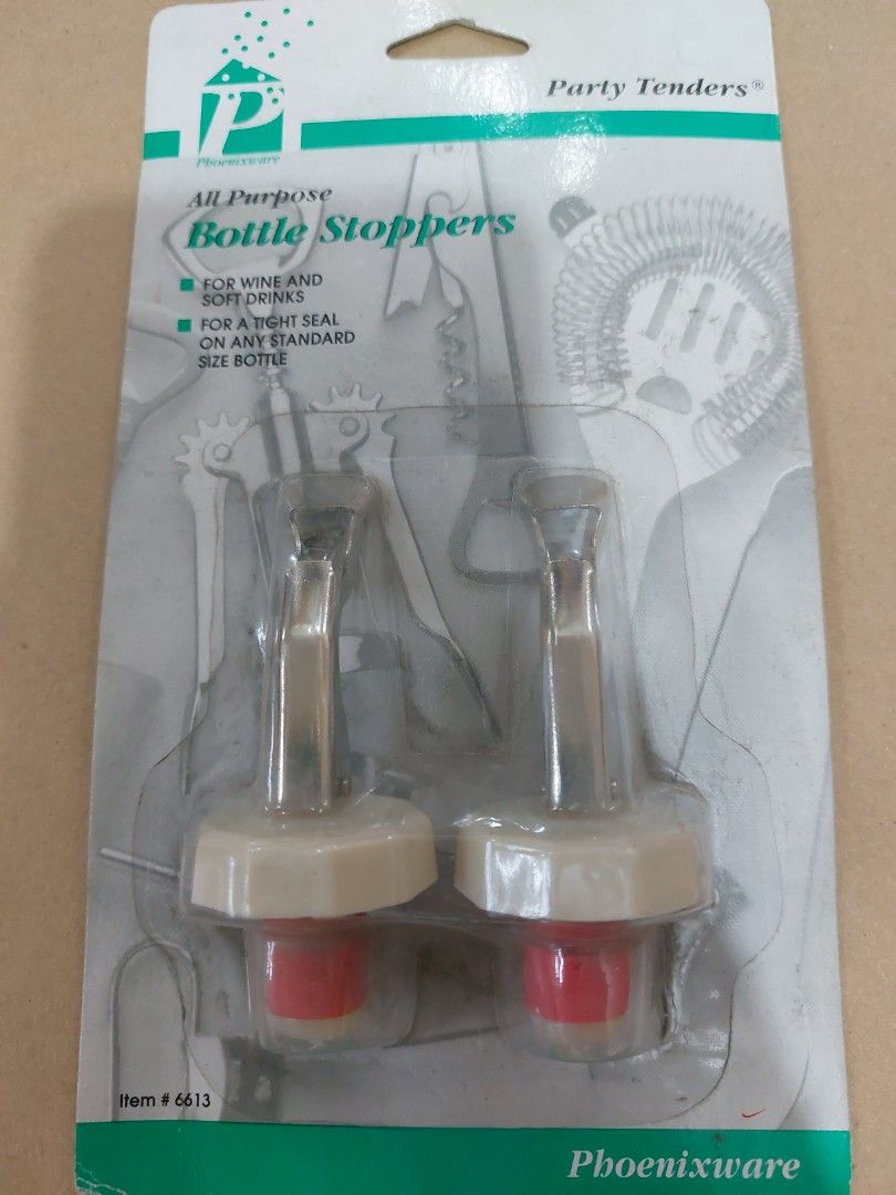 2 pcs all purpose bottle stoppers (Category: Other Kitchenware & Tableware) located in Quezon City. Submitted by cynlchan (Listing ID 1293949906, Image 1). Description: A US brand, Phoenix ware by Gemco. Very convenient and useful for half used wines and other long neck bottled sauces.