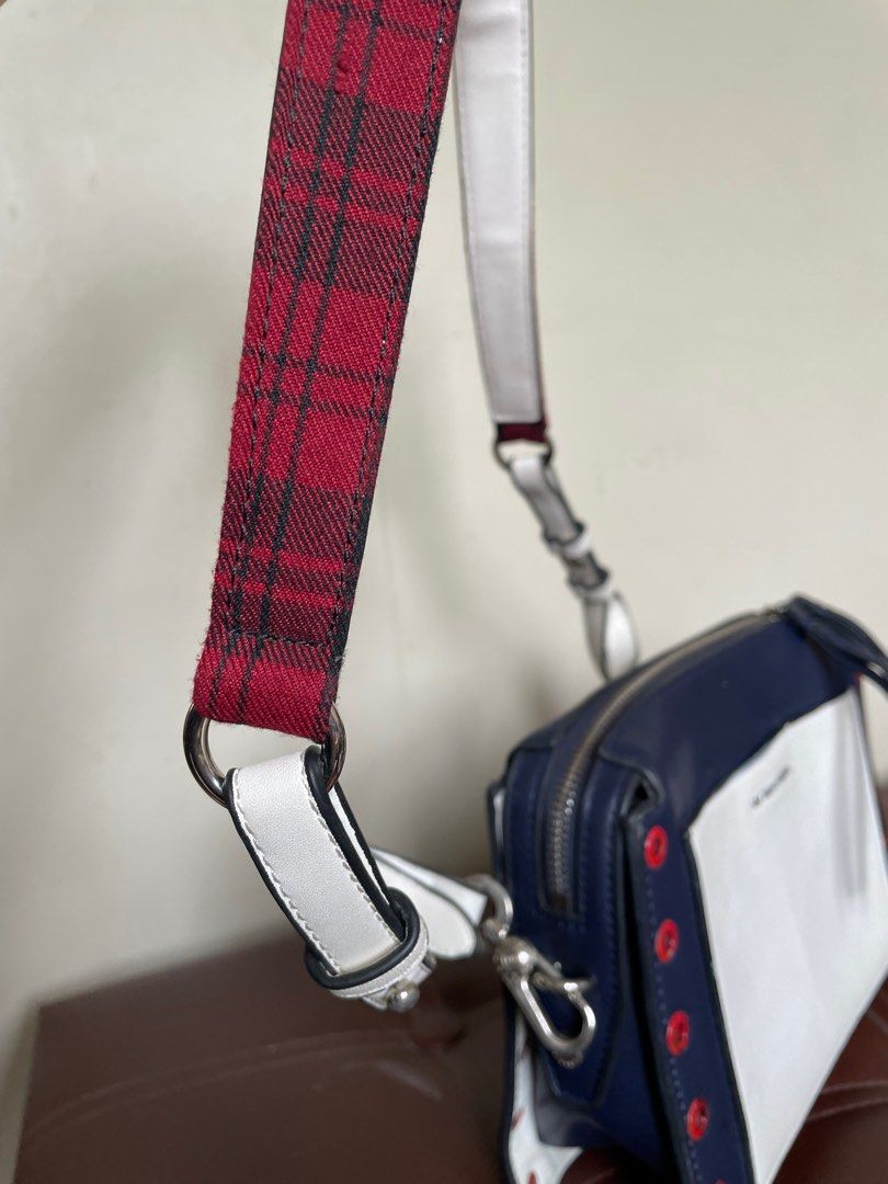 Charles & Keith Embellished Crossbody Bag (Category: Cross-body Bags) located in Marilao. Submitted by aint_b23 (Listing ID 1293962080, Image 2). Description: super pretty pa outside, only issue is seen on the inside. pag ginagamit ko nilalagyan ko ng cloth sa ilalim para hindi humawa yung leather sa mga gamit ko. rfs: decluttering SF to be shouldered by the buyer.