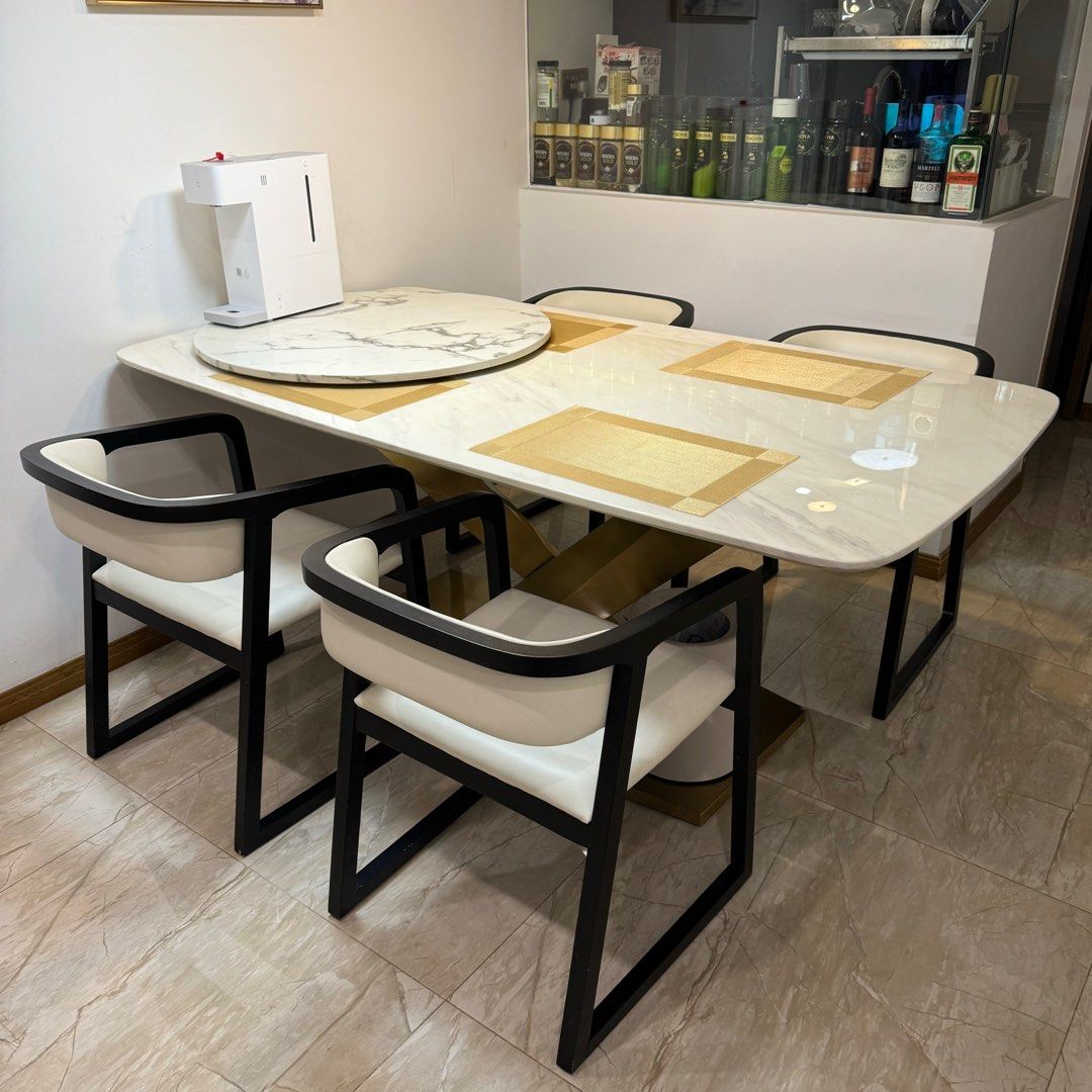 Dining Table Set (Category: Tables & Sets) located in Singapore. Submitted by thcontagious (Listing ID 1294066533, Image 1). Description: ✅ New and in good condition ✅ Dimensions: Table - 1m (W) * 1.8m(L) * 0.78m(H), 2cm thickness marble Chair - 0.54m (W) * 0.54m (L) * 0.67m (H) ✅ Real Marble ✅ Please arrange your own transport ✅ Negotiable for fast deals.