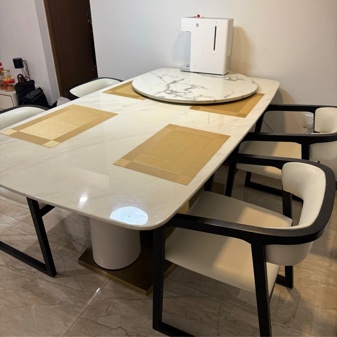Dining Table Set (Category: Tables & Sets) located in Singapore. Submitted by thcontagious (Listing ID 1294066533, Image 2). Description: ✅ New and in good condition ✅ Dimensions: Table - 1m (W) * 1.8m(L) * 0.78m(H), 2cm thickness marble Chair - 0.54m (W) * 0.54m (L) * 0.67m (H) ✅ Real Marble ✅ Please arrange your own transport ✅ Negotiable for fast deals.