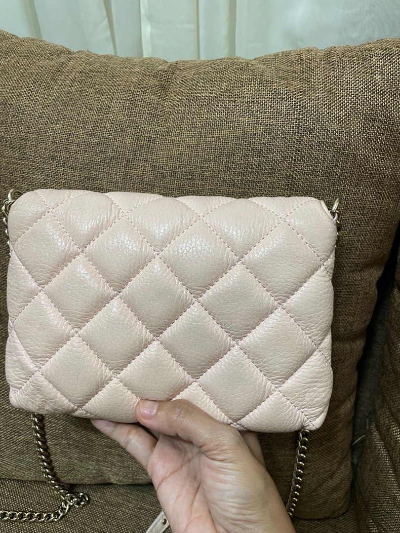 Kate spade small quilted sling bag (Category: Luxury Bags & Wallets) located in San Pablo. Submitted by prelovedbymistyblue (Listing ID 1293954483, Image 3). Description: Authentic KS small sling bag. With signs of use on the leather and some scratches on the hardware. Guaranteed authentic. Selling low for 4500. Slightly negotiable. .