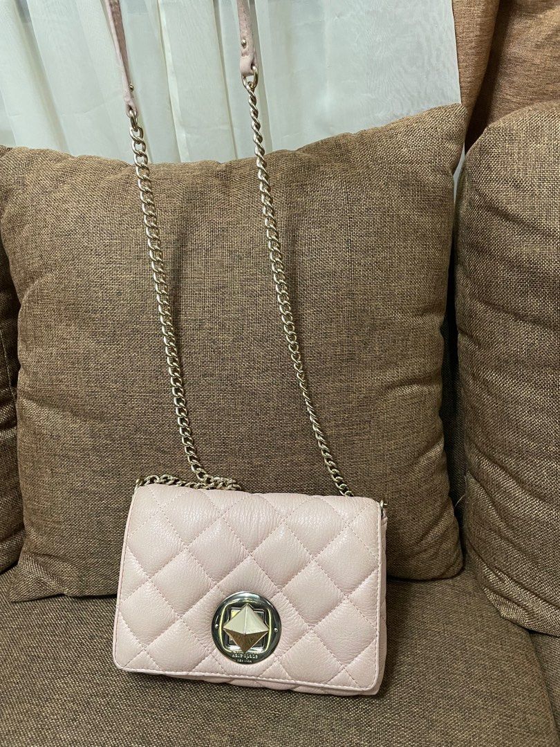 Kate spade small quilted sling bag (Category: Luxury Bags & Wallets) located in San Pablo. Submitted by prelovedbymistyblue (Listing ID 1293954483, Image 1). Description: Authentic KS small sling bag. With signs of use on the leather and some scratches on the hardware. Guaranteed authentic. Selling low for 4500. Slightly negotiable. .