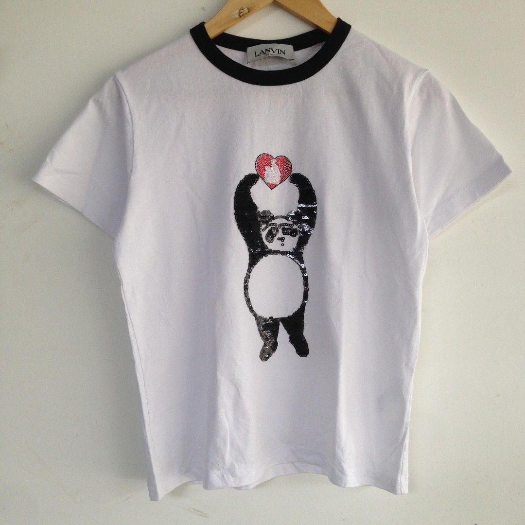 Lanvin Panda White Tee (Category: Luxury Apparel) located in San Fernando. Submitted by hellokteesph (Listing ID 1293996403, Image 1). Description: Lanvin Paris Medium on tag no flaws, parang di nagamit EUC condition: 10/10 color rate: 10/10 jnt direct (jnt app) gcash payment.