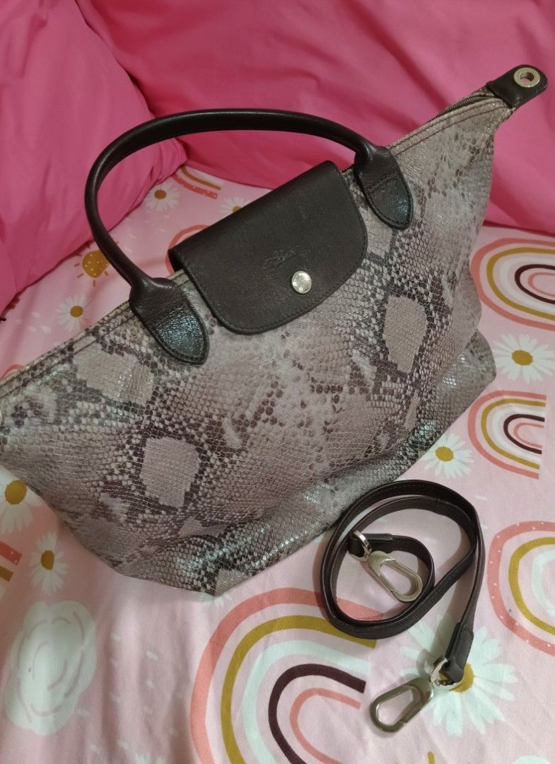 Limited Edition Longchamp Python Le Pliage (Category: Cross-body Bags) located in Quezon City. Submitted by itsncole (Listing ID 1293964943, Image 1). Description: Preloved Limited Edition Longchamp Python Le Pliage - medium size located QC/Marikina.