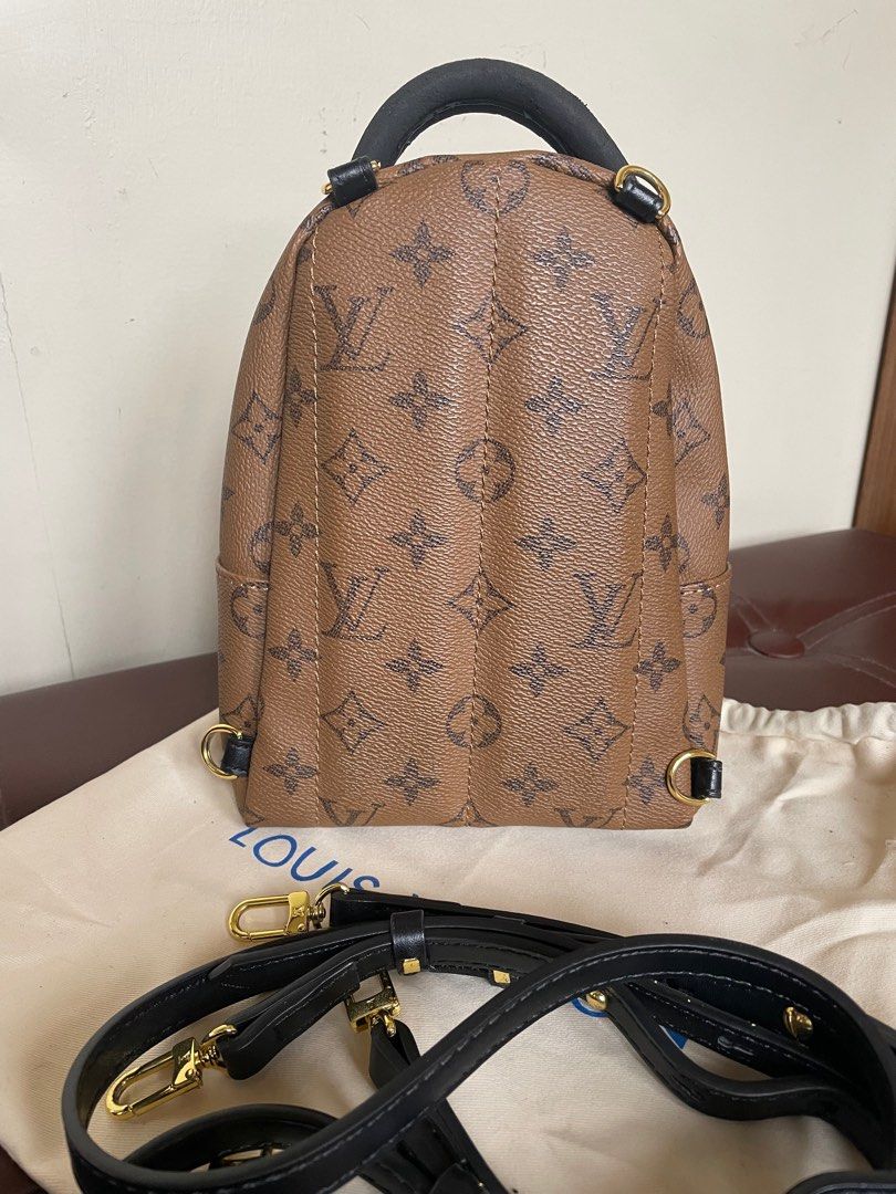 LV Palm Spring (Category: Luxury Bags & Wallets) located in Marilao. Submitted by aint_b23 (Listing ID 1293961412, Image 3). Description: Leather issue on top (you can see in the picture) you can put twilly para hindi makita or iparepair sa bag doctors, all in all like new leather No flaws on hardware (super kinis pa) with dustbag + intact straps SF to be shouldered by the buyer.