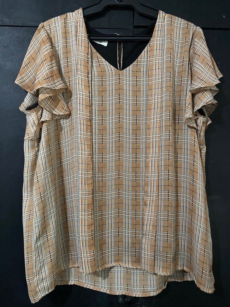 Magenta checkered blouse with ribbon tie (Category: Blouses) located in Mandaluyong City. Submitted by napierj (Listing ID 1293931919, Image 1). Description: Never been used! Cut tags, washed and stored. With ribbon tie on the neckline. Super comfy fabric, perfect for everyday use or office. Size M but can fit upto 1XL..