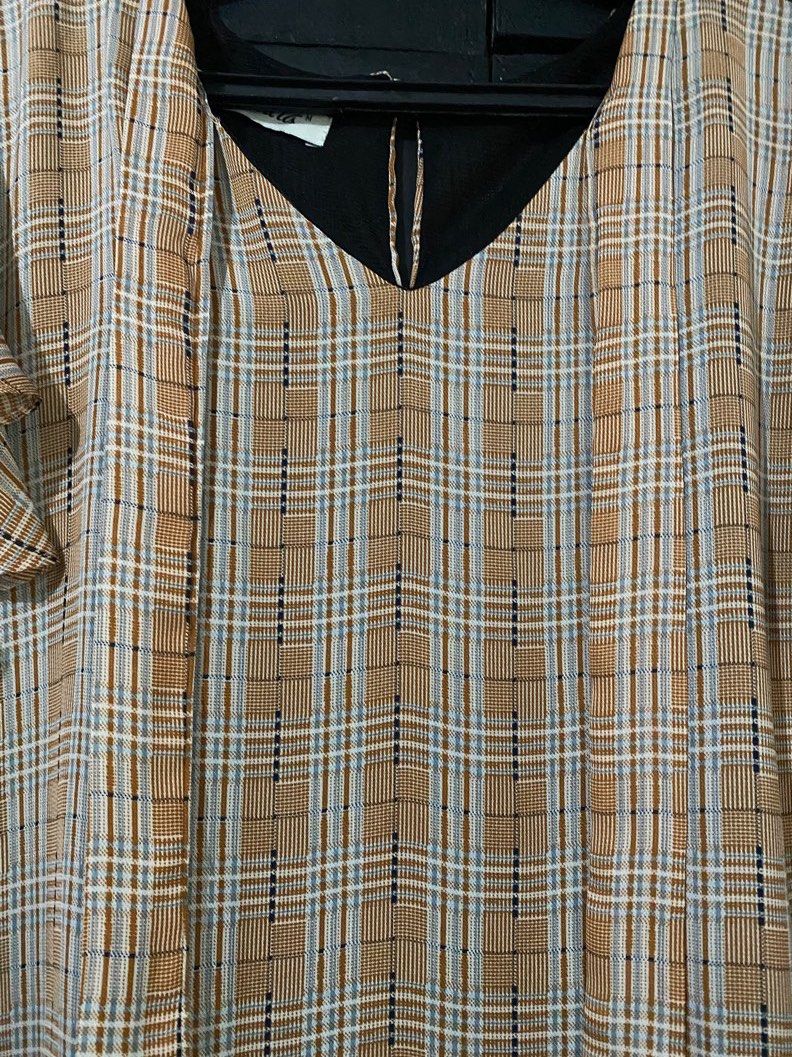 Magenta checkered blouse with ribbon tie (Category: Blouses) located in Mandaluyong City. Submitted by napierj (Listing ID 1293931919, Image 2). Description: Never been used! Cut tags, washed and stored. With ribbon tie on the neckline. Super comfy fabric, perfect for everyday use or office. Size M but can fit upto 1XL..