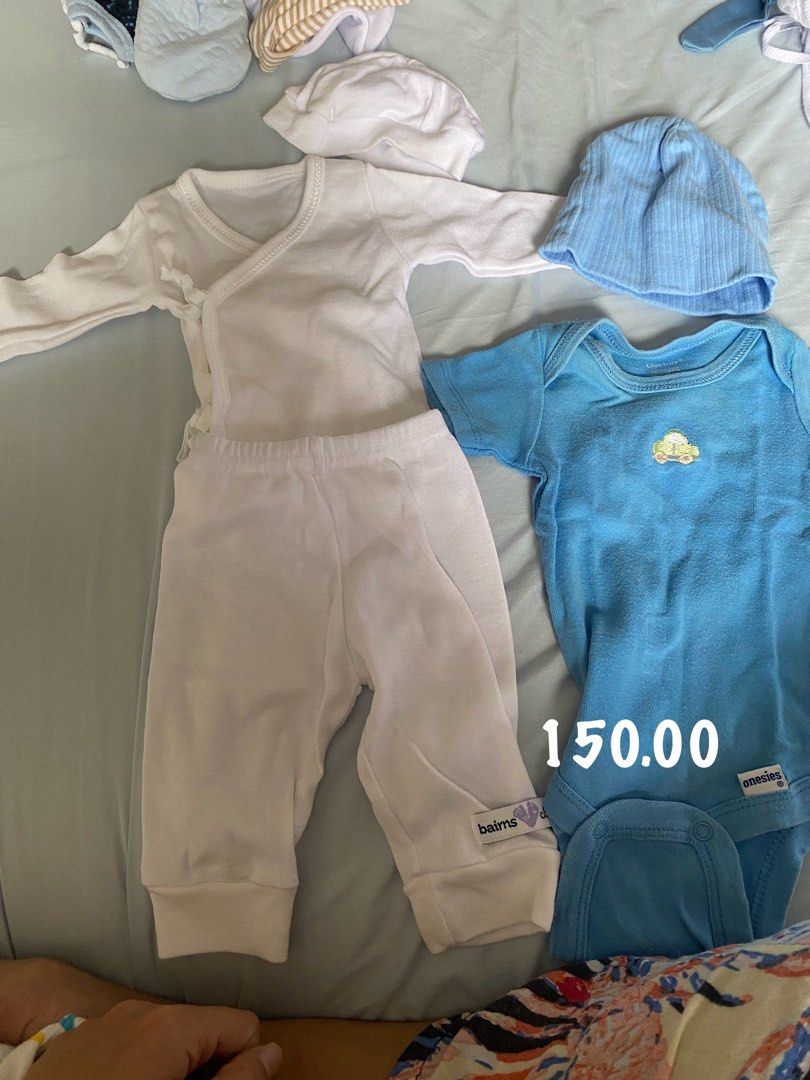 Preemie clothes (with freebie) (Category: Babies & Kids Fashion) located in Las Pinas. Submitted by ketshops (Listing ID 1293985798, Image 1). Description: Preemie clothes with extra freebies. see photos. 150/set.