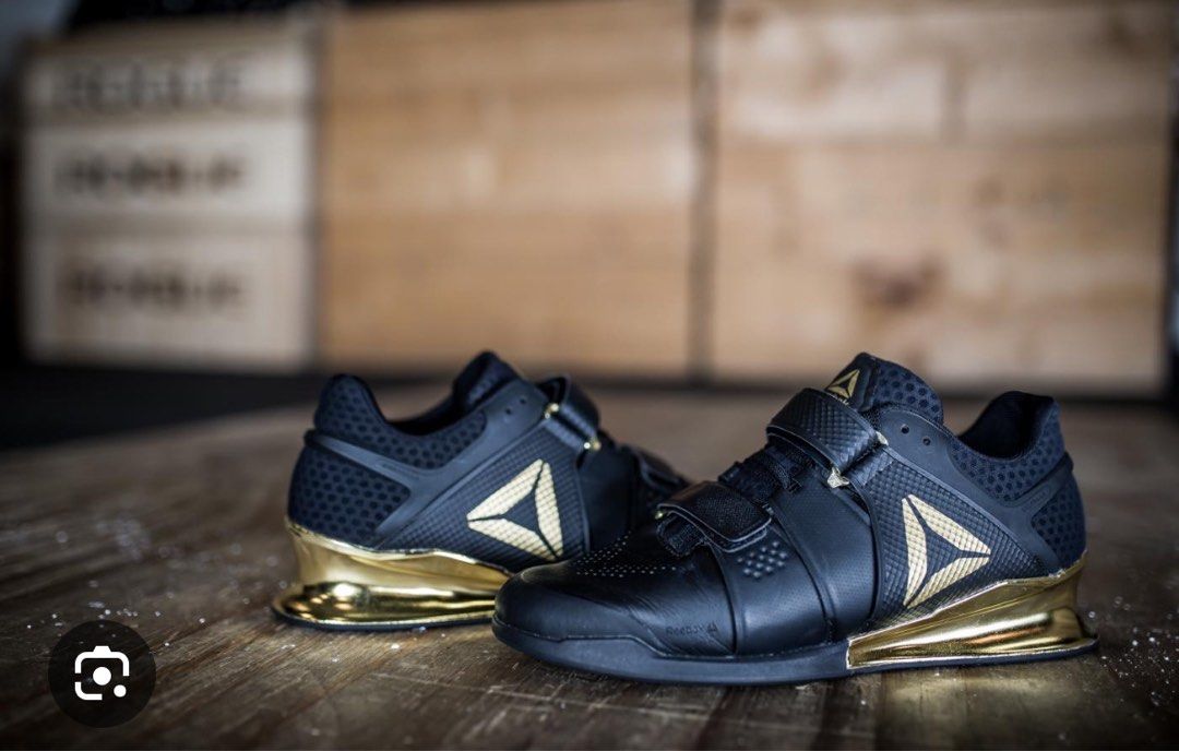 black and gold reebok shoes