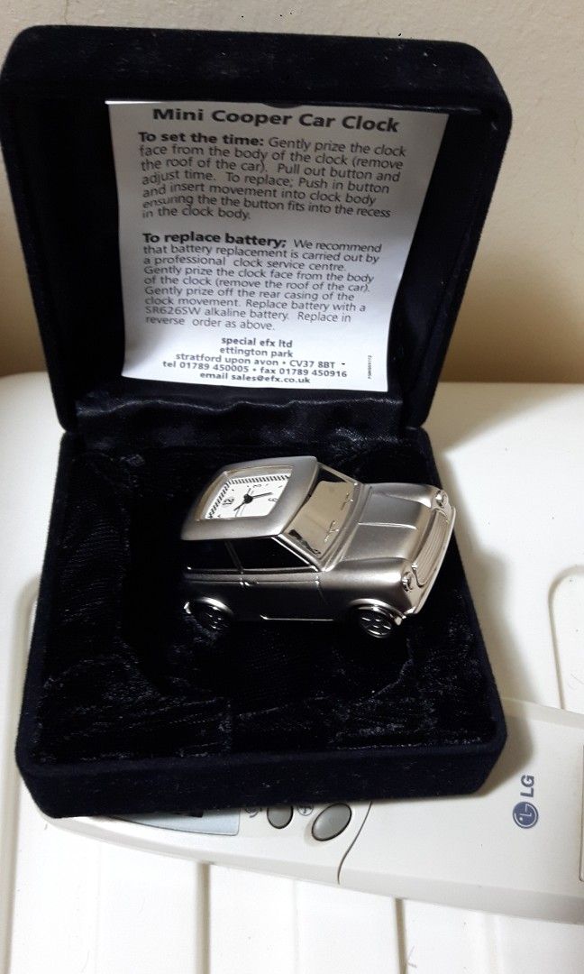 Solid silver Mini Morris clock. (Category: Vintage Collectibles) located in Singapore. Submitted by mokeman (Listing ID 1294028551, Image 1). Description: Brand new, kept in box long time, bty taken out but not sure if still works as bought it to display in my Mini car collection only. Very solid n heavy, bought frm the U.K. cash n carry..